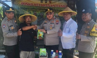 Polres-Pelabuhan-Tanjungperak-Salurkan-Bantuan-Bibit-dan-Obat-Hama-untuk-Kelompok-Tani